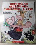 Cover of 'There Was An Old Lady Who Swallowed A Cow' by Lucille Colandro